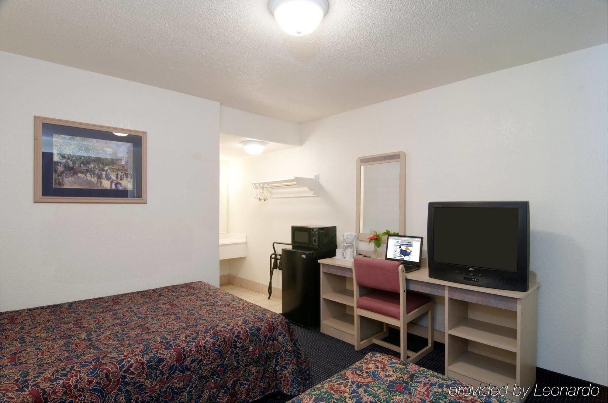 Americas Best Value Inn And Suites Groves Quarto foto