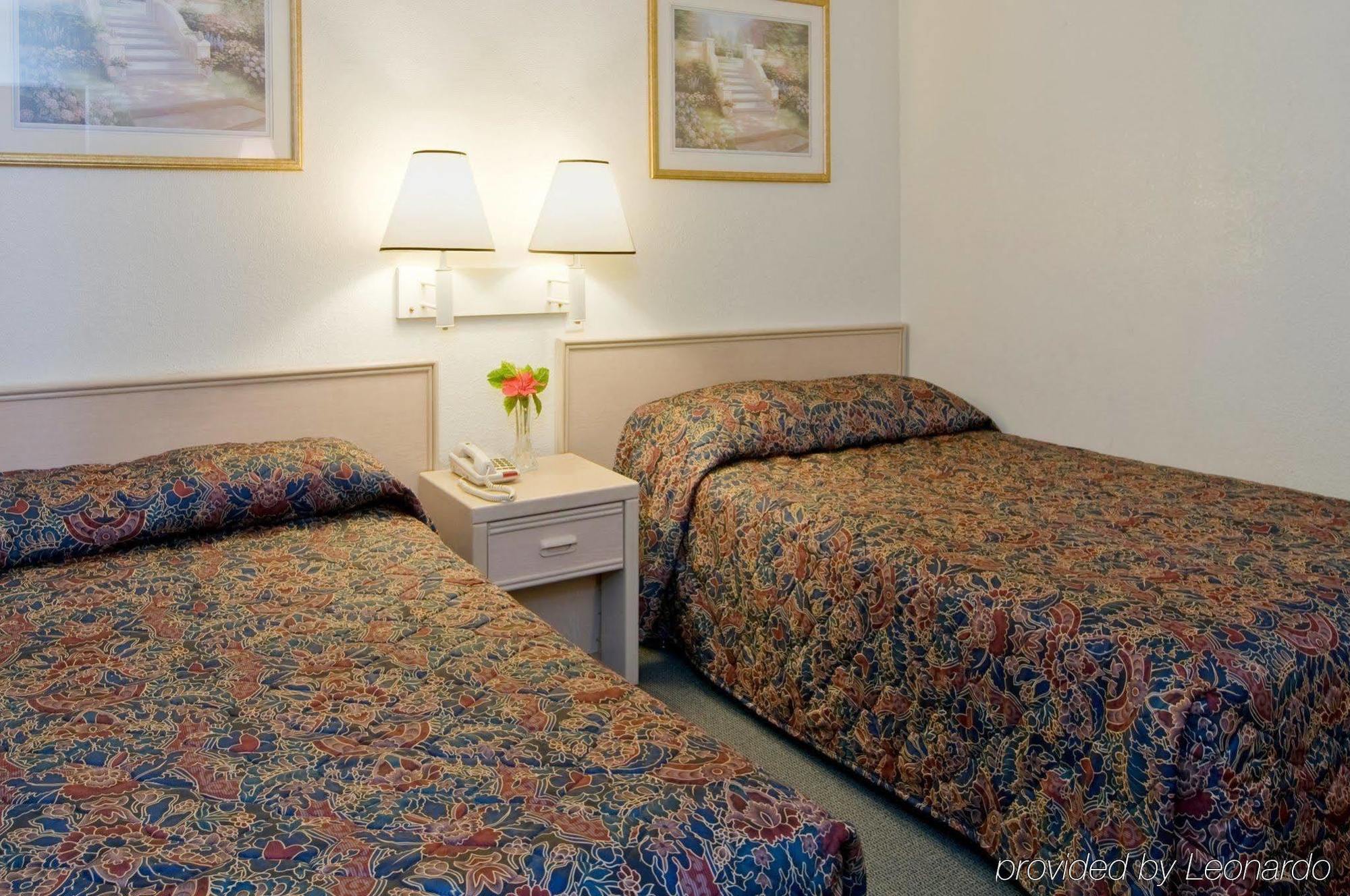 Americas Best Value Inn And Suites Groves Quarto foto